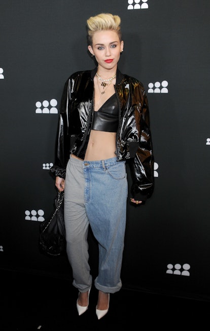 Miley Cyrus is the queen of "ugly" '90s trends, from overalls to grunge.