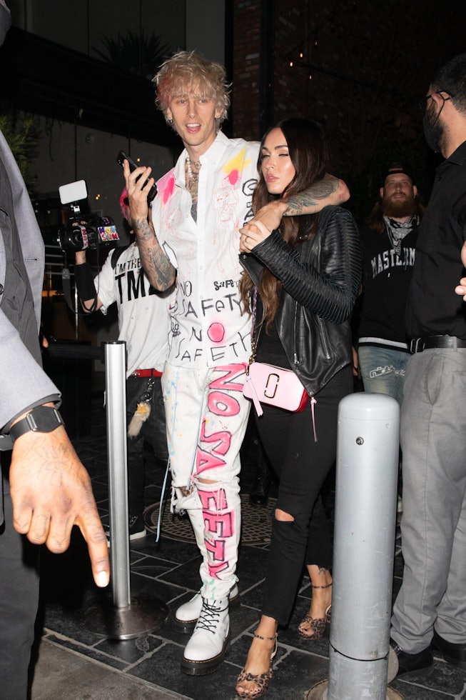 LOS ANGELES CA - SEPTEMBER 24:  Machine Gun Kelly and Megan Fox are seen leaving a restaurant on Sep...