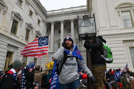 Supporters of US President Donald Trump protest as they storm the US Capitol on January 6, 2021, in ...