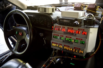 Picture taken inside a replica of the DeLorean, a time-machine vehicle which appeared in the movie " Back to the Future'' in 1985, is displayed during an anniversary event at the Fashion Museum in Santiago on October 21, 2015 -- the exact date in the future that actor Michael J. Fox's Marty McFly travelled to in the souped-up DeLorean fitted with a flux capacitor in the second part of the blockbuster trilogy. Fans of the series are marking Wednesday's landmark date by celebrating some of the predictions that came true in the futuristic saga -- and some that didn't. The films follow the time-travelling adventures of young Marty, a teenager living in small-town America in 1985 played by Michael J. Fox. He sets out in a DeLorean car converted to voyage the space-time continuum by his eccentric inventor friend Doc Brown.   AFP PHOTO / MARTIN BERNETTI        (Photo credit should read MARTIN BERNETTI/AFP via Getty Images)