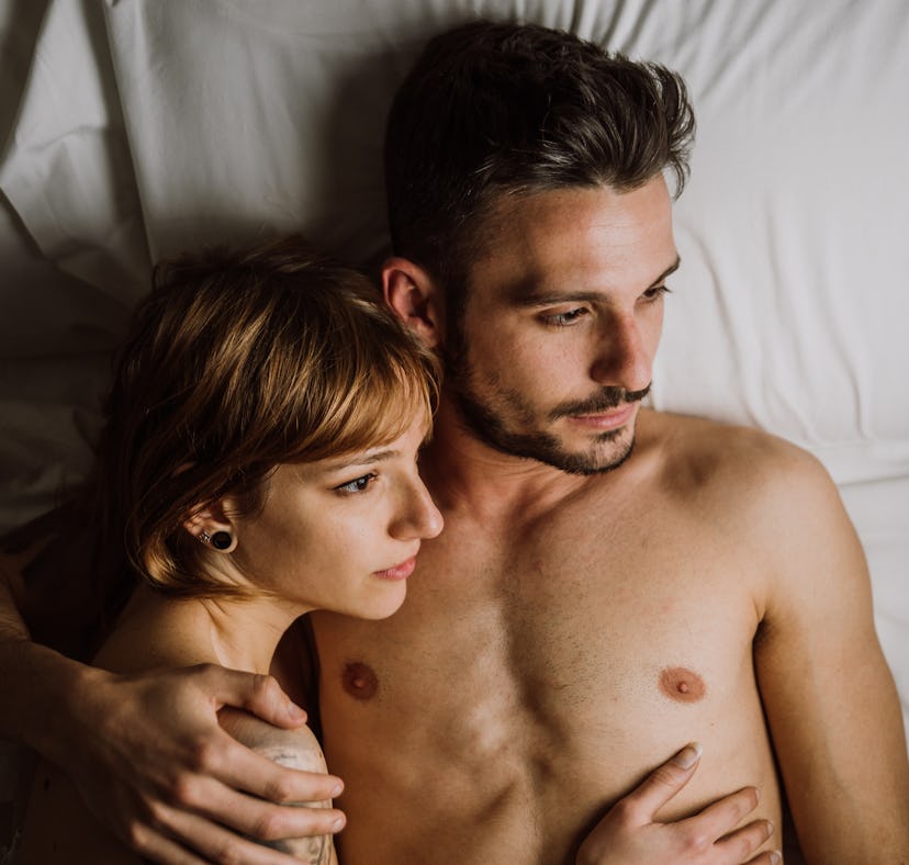 Couple in bed realizes intimacy and sex changes after someone cheats.