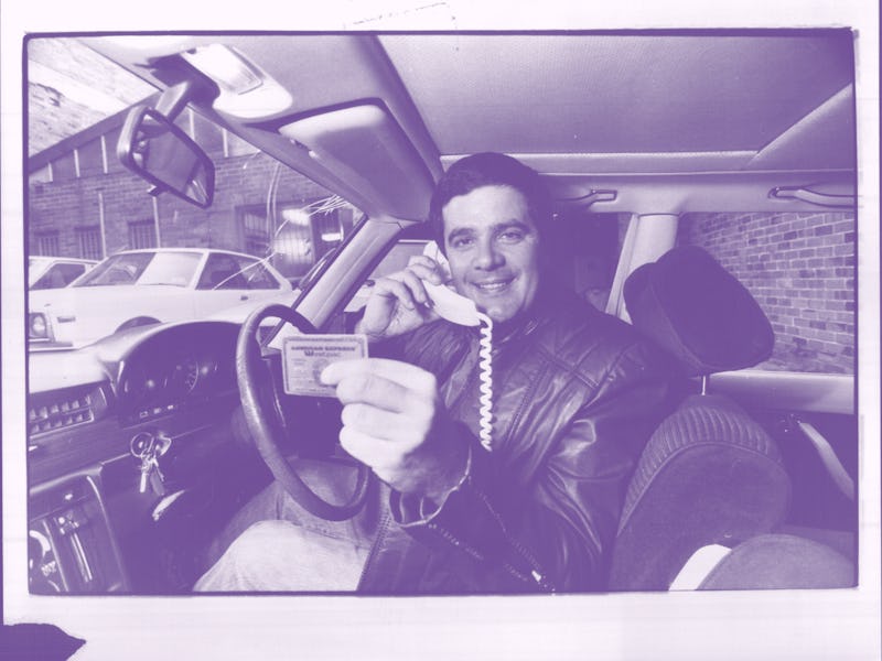 Simon Townsend, seen here with his "Gold Bank Card", and "Car Phone". May 31, 1983. (Photo by Philip...