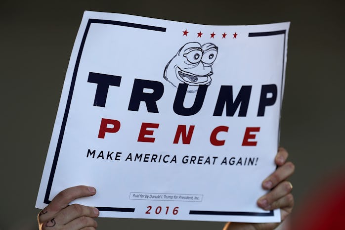 MINNEAPOLIS, MN - NOVEMBER 06:  A supporter holds a campaign sign for Republican presidential nomine...