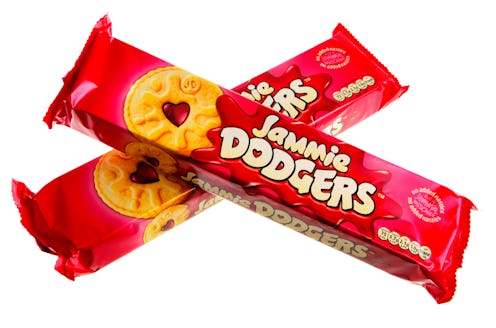Helston, Cornwall, UK - May 17, 2013: Two unopened packets of Jammie Dodgers biscuits. These are mad...