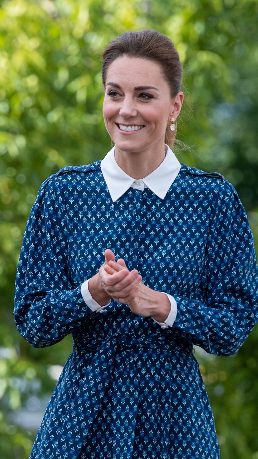 NORFOLK, UNITED KINGDOM - JULY 05: Catherine, Duchess of Cambridge applies hand sanitizer during a v...