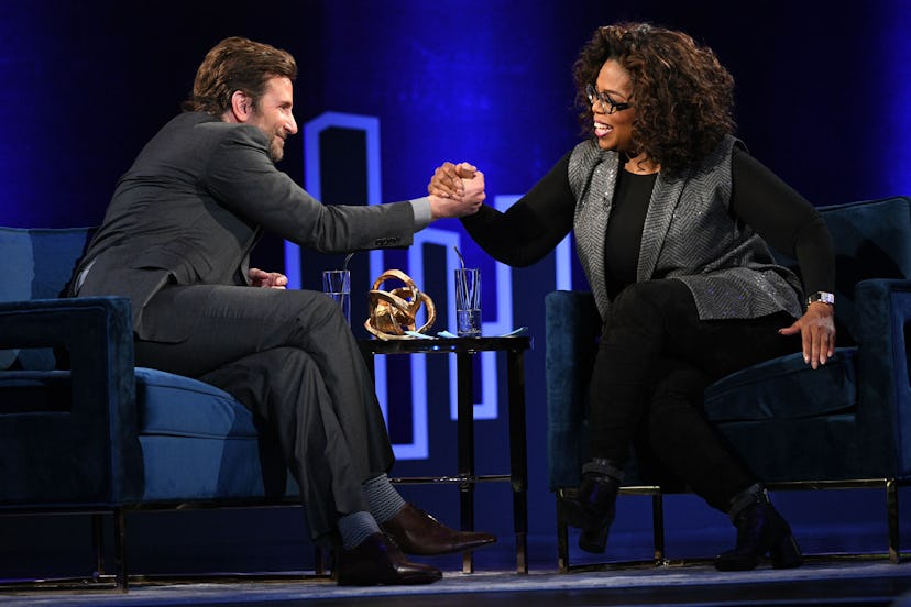 Oprah Winfrey who host celebrity podcast Super Soul speaks onstage with Bradley Cooper.