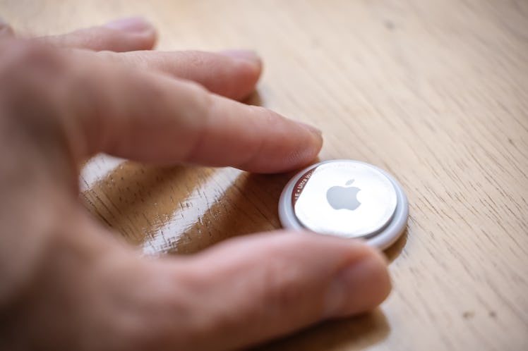 Montreal, Canada, April 30 2021: Human hand holding the new Apple product released on April 30 2021,...