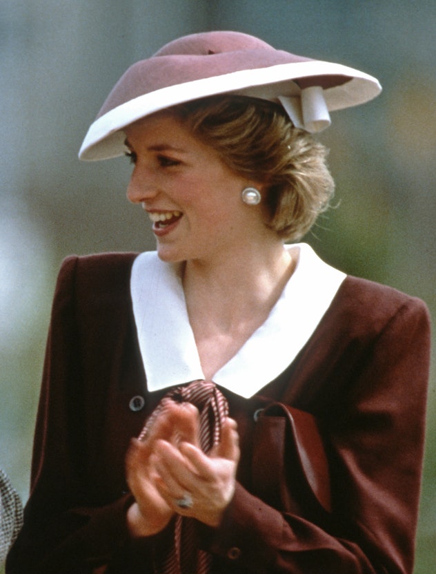 KELOWNA, CANADA - MAY 05: Diana, Princess of Wales, wearing a maroon dress with a white collar desig...