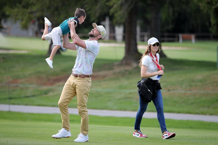 CRANS-MONTANA, SWITZERLAND - AUGUST 27: Justin Timberlake lifts up his son Silas next to his wife Je...