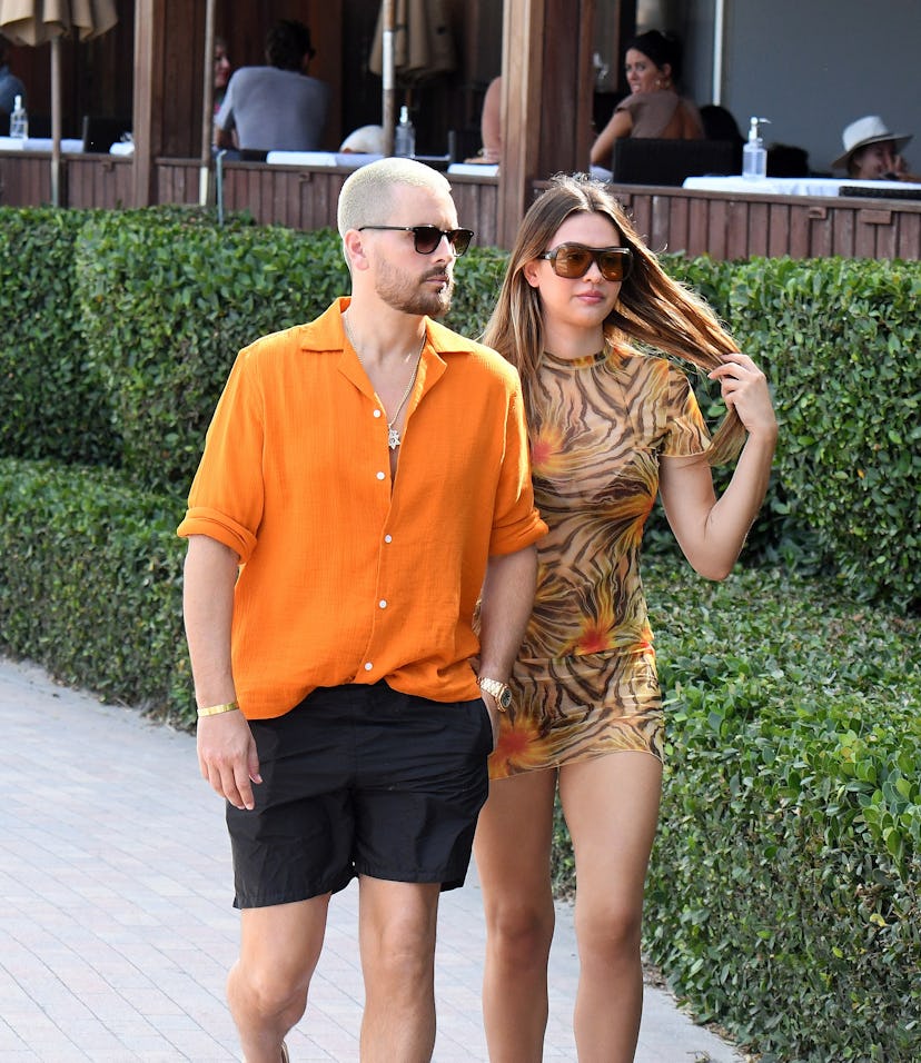 MIAMI FL - APRIL 7: Scott Disick and Amelia Hamlin are seen walking at the beach on April 7, 2021 in...