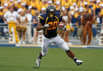 MORGANTOWN, WV - SEPTEMBER 01: Shawne Alston #20 of the West Virginia Mountaineers carries the ball...