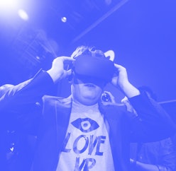 Palmer Luckey, Oculus founder,  tries on the Oculus Rift  after an Oculus VR news conference "Step i...
