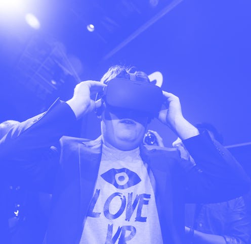 Palmer Luckey, Oculus founder, tries on the Oculus Rift after an Oculus VR news conference "Step i...