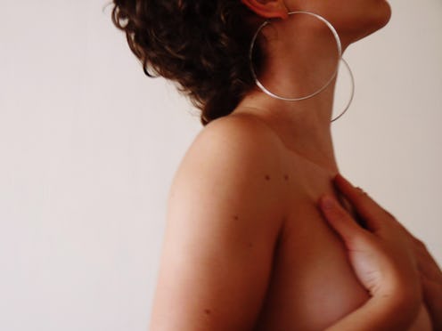 woman covering her chest