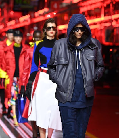 MARANELLO, ITALY - JUNE 13: A model walks the runway at the fashion debut of the first co-ed Ferrari...