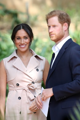 Prince Harry, Duke of Sussex and Meghan, Duchess of Sussex — shown here outdoors — purchased website...