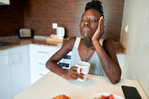 A person feels sleepy after eating. Why am I tired after I eat? A dietitian explains the weird reaso...