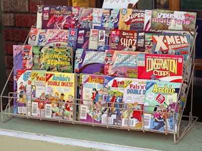 "Spokane, Washington, USA - August 25, 2012: Assortment of popular comic books for sale outside of a...