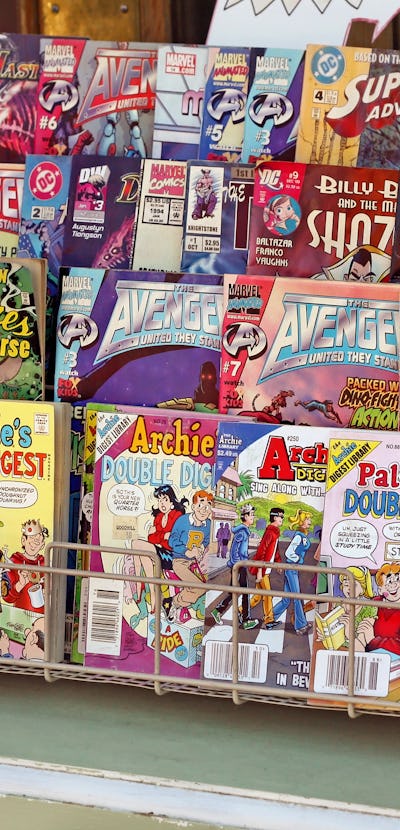 "Spokane, Washington, USA - August 25, 2012: Assortment of popular comic books for sale outside of a...