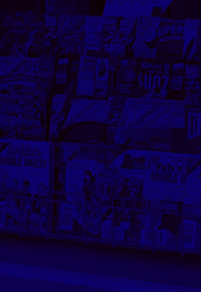 "Spokane, Washington, USA - August 25, 2012: Assortment of popular comic books for sale outside of a comic book shop in downtown Spokane, Washington."