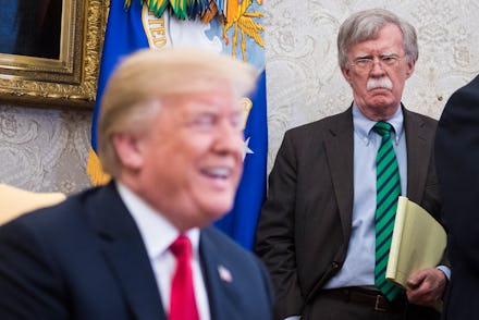 WASHINGTON, DC - MAY 17: National Security Advisor John Bolton listens as President Donald J. Trump ...