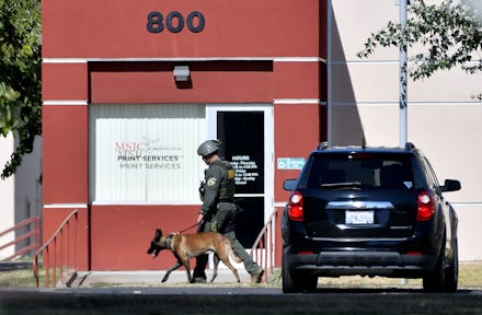 SAN JACINTO, CA - NOVEMBER 06: A Riverside County sheriff deputy searches Mt. San Jacinto College in...