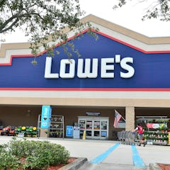 PEMBROKE PINES, FLORIDA - JULY 18: Customers wearing face masks enter a Lowe's Home Improvement stor...