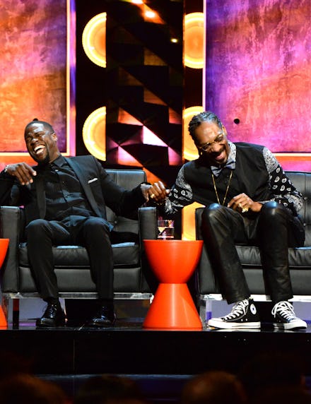 LOS ANGELES, CA - MARCH 14:  Roastmaster Kevin Hart (L) and rapper Snoop Dogg onstage at The Comedy ...