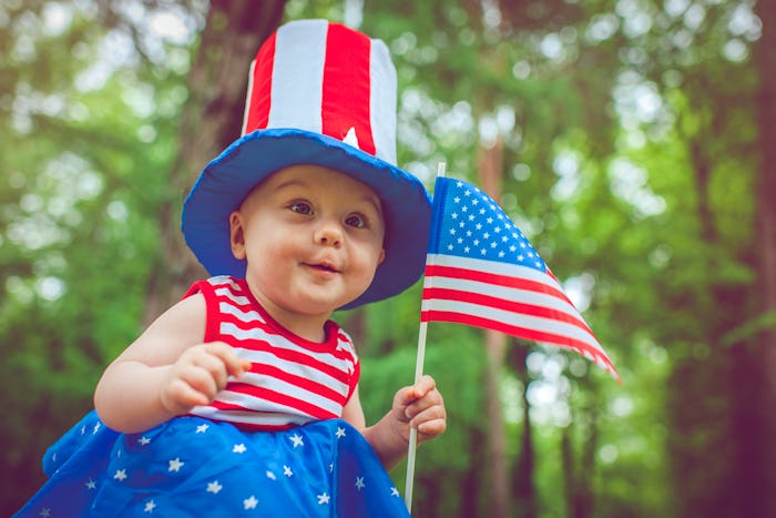 Cute baby celebrating Independence day, but is it safe to take babies to see fireworks?