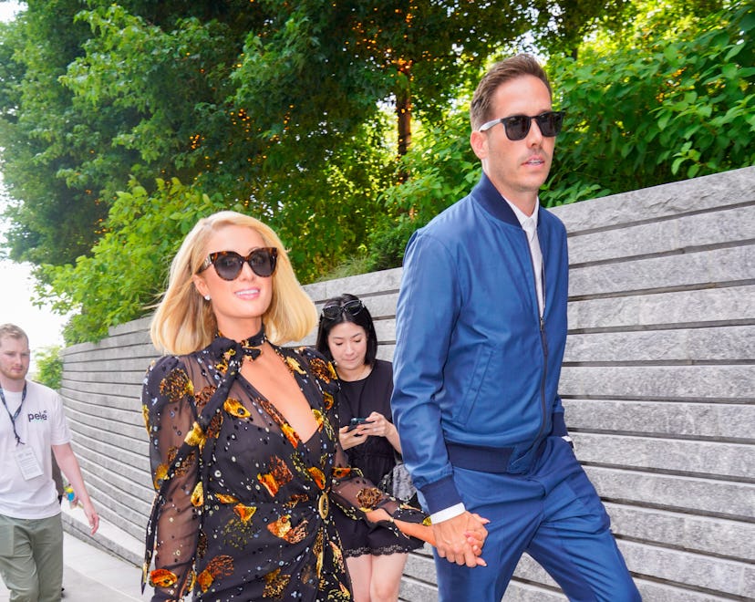 Paris Hilton holds hands with fiancé Carter Reum in New York City. (Photo by Gotham/GC Images)