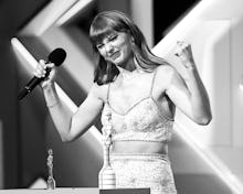 LONDON, ENGLAND - MAY 11: (Editors note: Image converted to black and white) Taylor Swift accepts th...