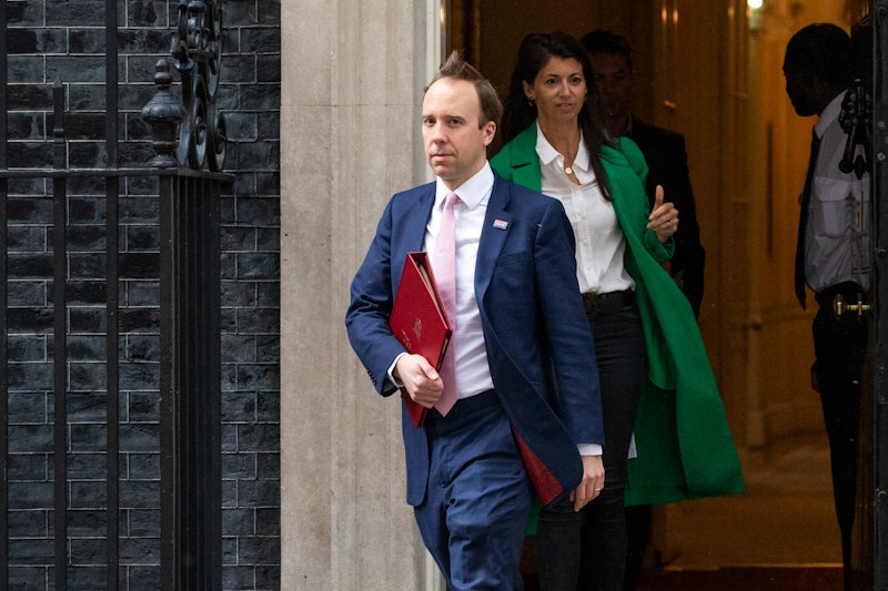 LONDON, ENGLAND  - MAY 01: Health Secretary Matt Hancock leaves 10 Downing Street with aide Gina Col...