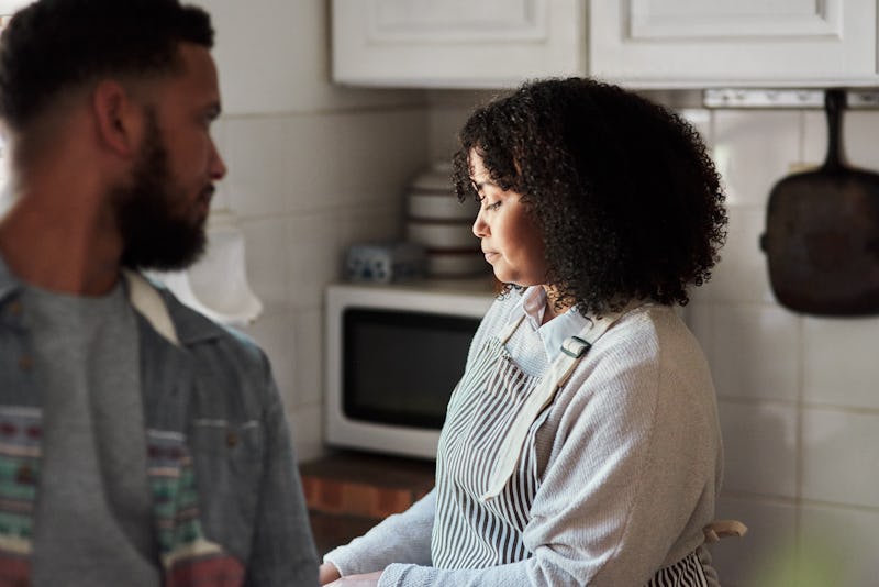 I don't really feel like cooking today, couple looking somber