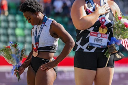 EUGENE, OREGON - JUNE 26: Gwendolyn Berry (L), third place, turns away from U.S. flag during the U.S...