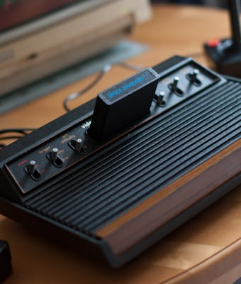 [UNVERIFIED CONTENT] Atari 2600 VCS console, full view, with joysticks and Commodore 1084S monitor p...