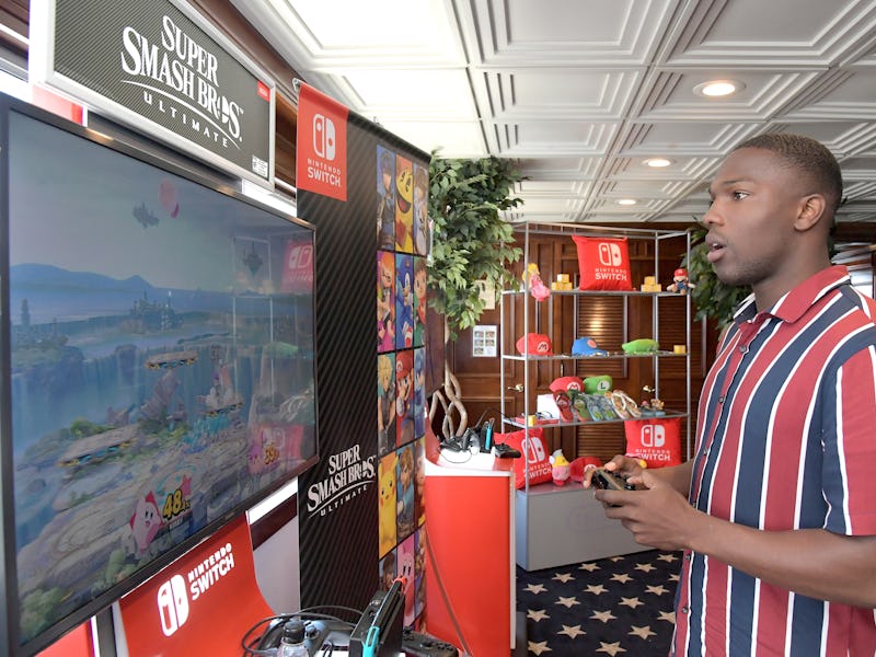SAN DIEGO, CA - JULY 21:  Tosin Cole tests his skills on Super Smash Bros. Ultimate for Nintendo Swi...