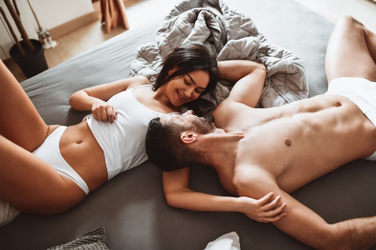 Couple in bed describes their most vivid sex dreams.