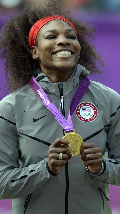 Serena William, shown here donning an Olympic gold medal, is driven to win. 