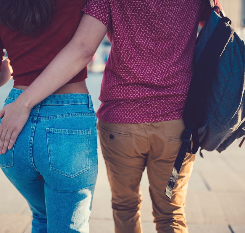 Young couple walking outside