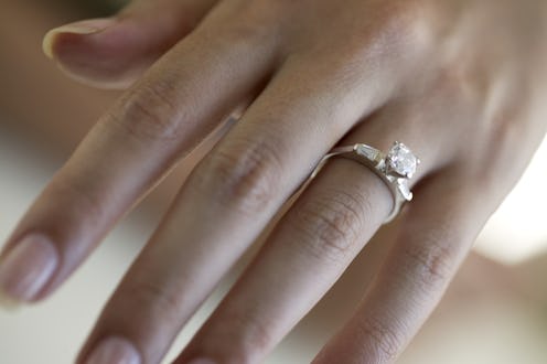 woman wearing engagement ring