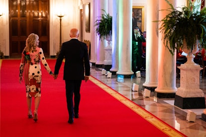 US President Joe Biden and First Lady Dr. Jill Biden exit the room after a White House event to comm...