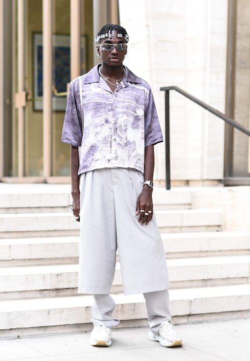 NEW YORK, NEW YORK - SEPTEMBER 07: Rickey Thompson is seen wearing a purple and white graphic top, c...