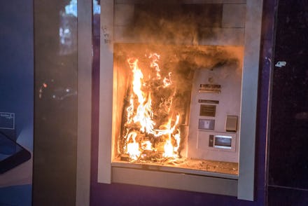 BARCELONA, CATALONIA, SPAIN - 2021/02/20: An ATM seen on fire during the demonstration.
Protesters d...
