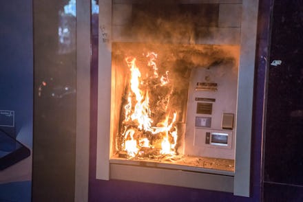 BARCELONA, CATALONIA, SPAIN - 2021/02/20: An ATM seen on fire during the demonstration.
Protesters d...