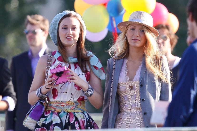 Leighton Meester and Blake Lively on the set of 'Gossip Girl' on July 5, 2010 in Paris, France.