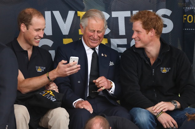 Prince Harry, Prince Charles, and Prince William at the 2014 Invictus Games.