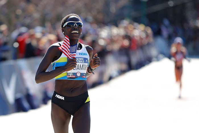 ATLANTA, GEORGIA - FEBRUARY 29:  Aliphine Tiliamuk reacts as she crosses the finish line to win the ...