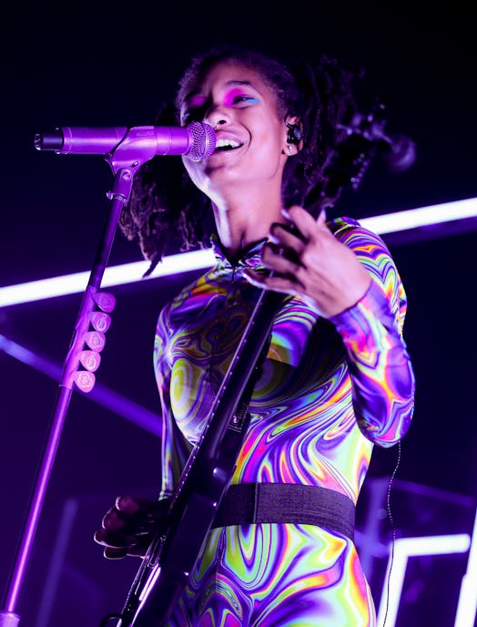 Willow Smith, shown here performing in Los Angeles under purple stage lights, shared her thoughts on...