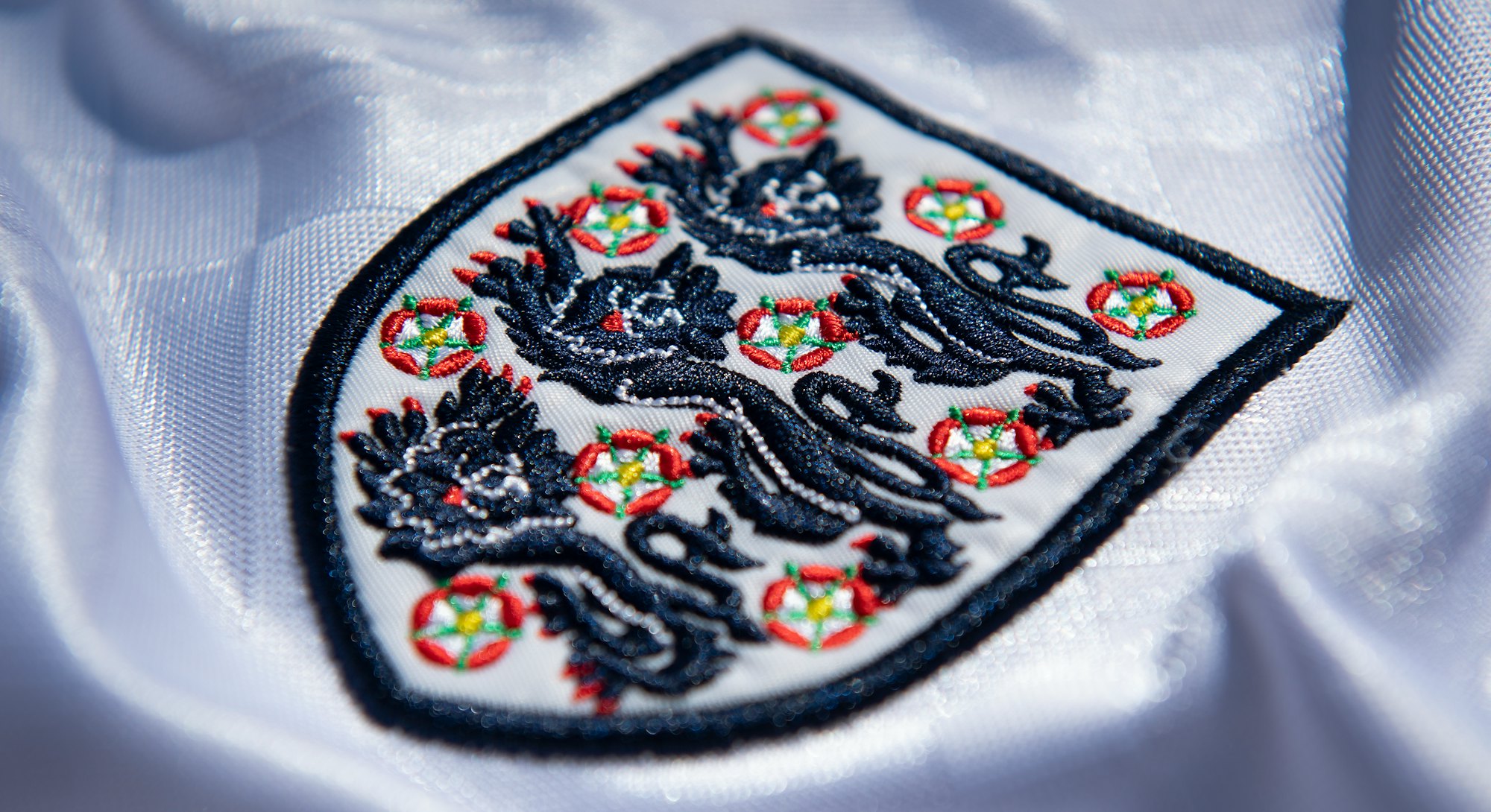 The three lions England crest on the England shirt in  2020