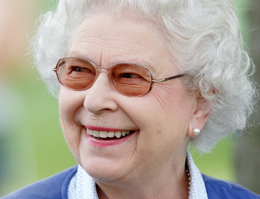 Queen Elizabeth smiling at the 2018 Royal Windsor Horse Show.